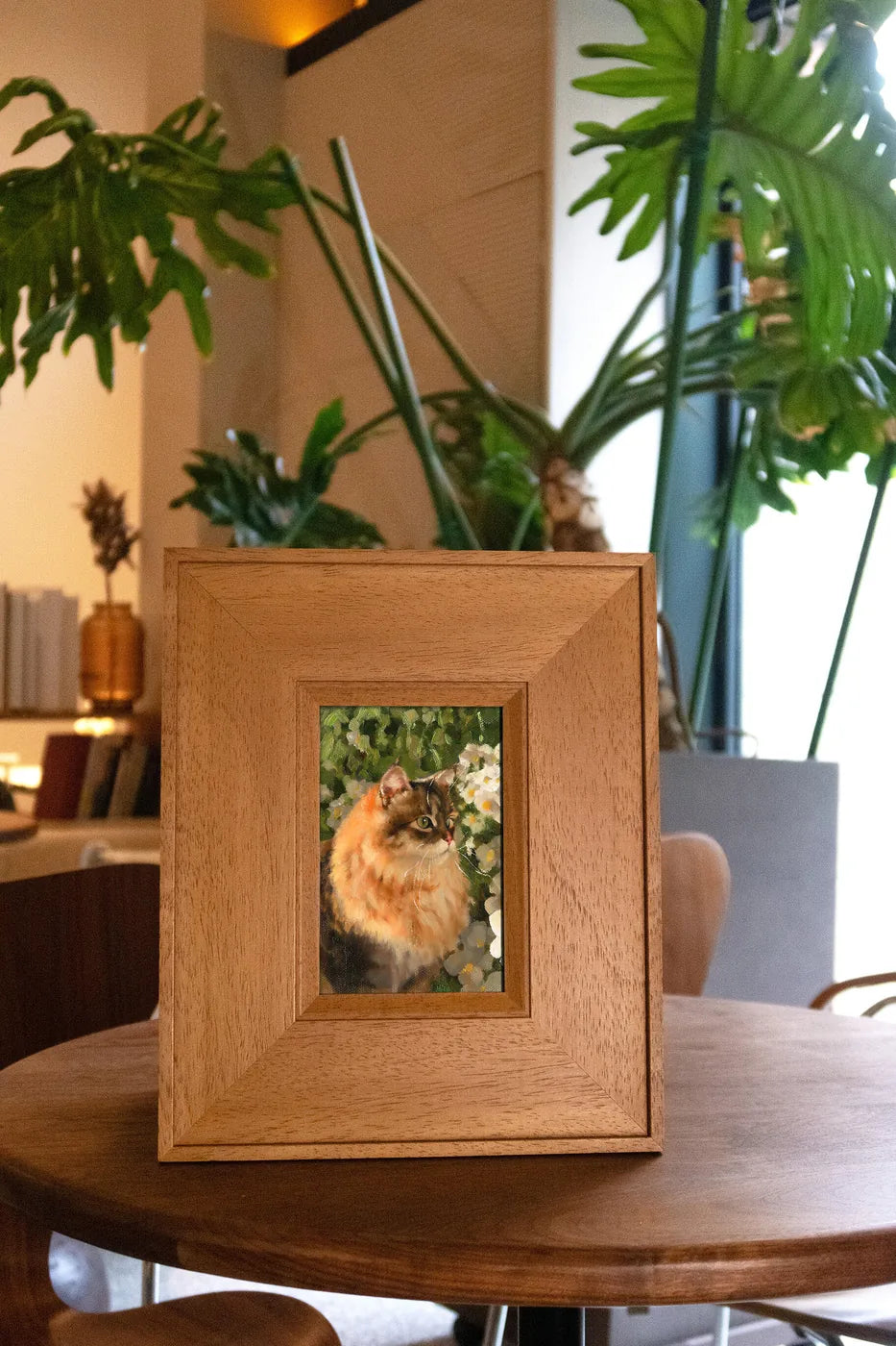Feifei with a dog in her portrait studio