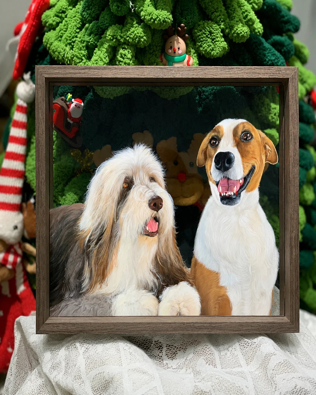 Two-dog glass portrait in a dark frame